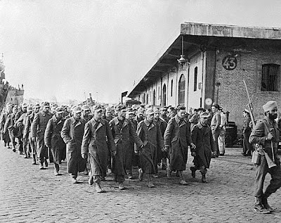 A Sikh soldier escorting German prisoners of war A Sikh soldier escorting German prisoners of war