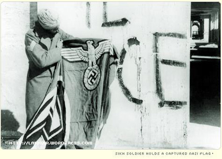 Sikh soldier holds a captured Nazi flag Sikh soldier holds a captured Nazi flag