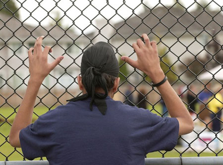 Gurmukh Aujla watching a soccer game from the outskirts because of the turban ban Gurmukh Aujla watching a soccer game from the outskirts because of the turban ban
