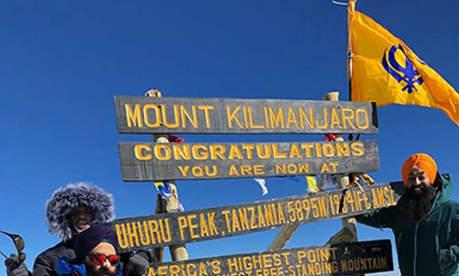 Flying the Nishan Sahib on Mt. Kilimanjaro